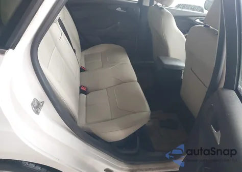 2015 Ford Focus Titanium z USA, uszkodzony, nr VIN 1FADP3J27FL230825